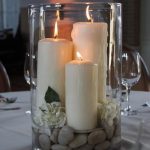 large hurricane vase with candles, rocks and gardenias - centerpiece - bjl