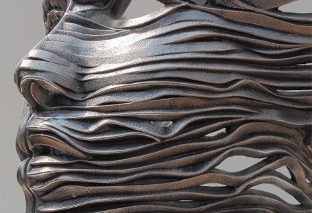 22 Creative Human Figure Metal Sculptures Composed of Unraveling Steel Ribbons by Gil Bruvel