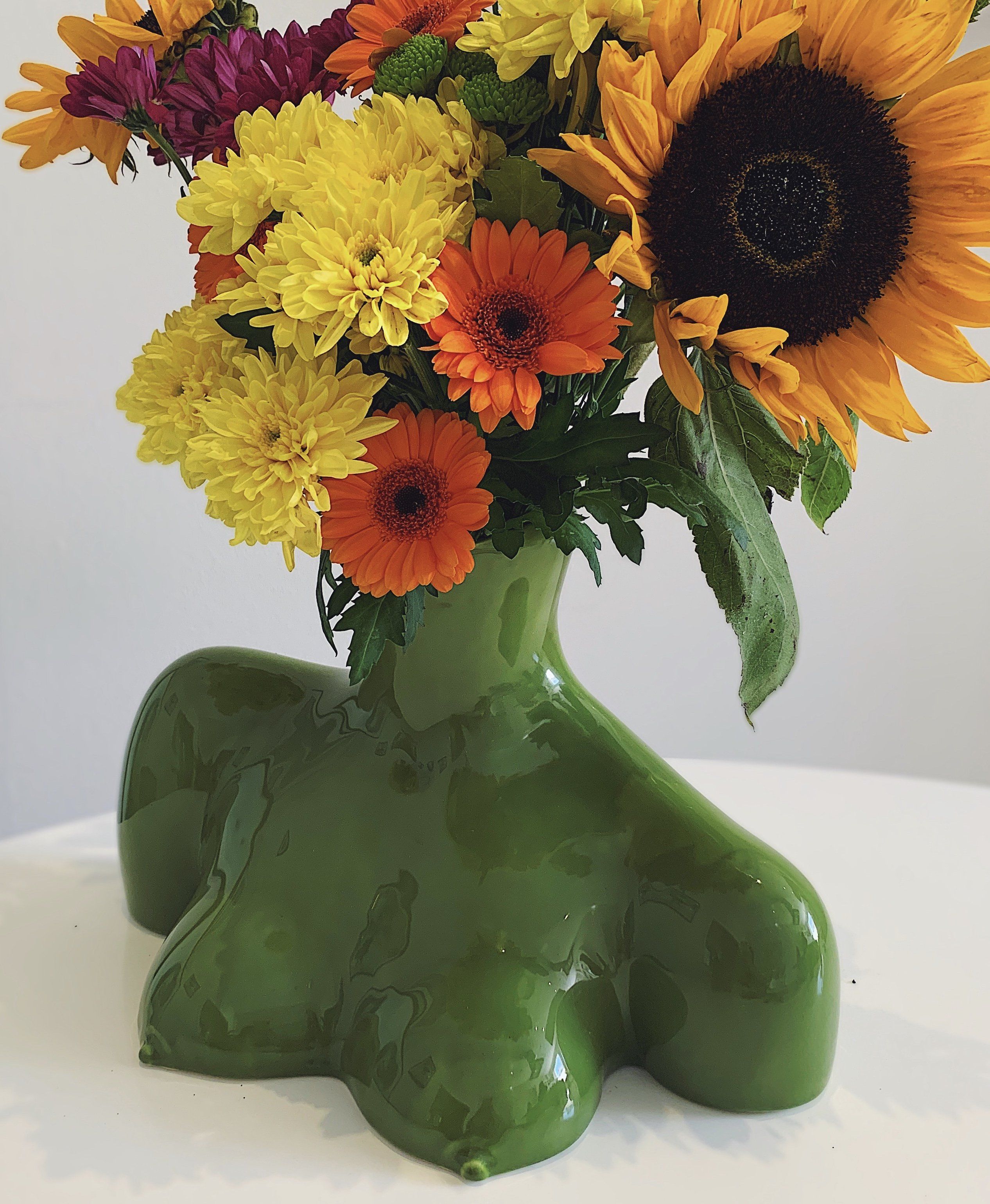 Decorate your space with our newest vase. Anissa Kermiche’s foray into ceramics results in this striking ceramic torso vase, a pleasing translation of her fascination with the female form. Fill it with foliage to bring an artistic mood to a side table. Finished with a smooth surface this piece can be filled with flower
