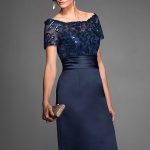 Brides: Jasmine Black Label. Glamorous, chic, and elegant, this dress will set you above the rest at your next special occasion. Made from luxurious Marquis Satin, the dress has a sheath skirt and bateau neckline created by beautiful floral pailette fabric on the bodice.