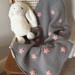 Crochet a beautiful cotton blend blanket studded with stars for a new baby with Kate Eastwood