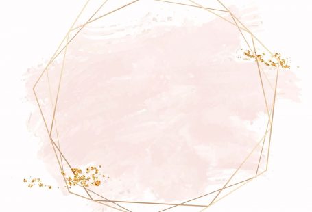 Gold geometric frame on a pink brushstroke background vector