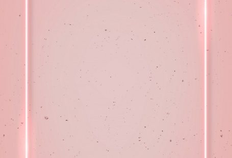 Rectangle pink neon frame on a pink  background vector