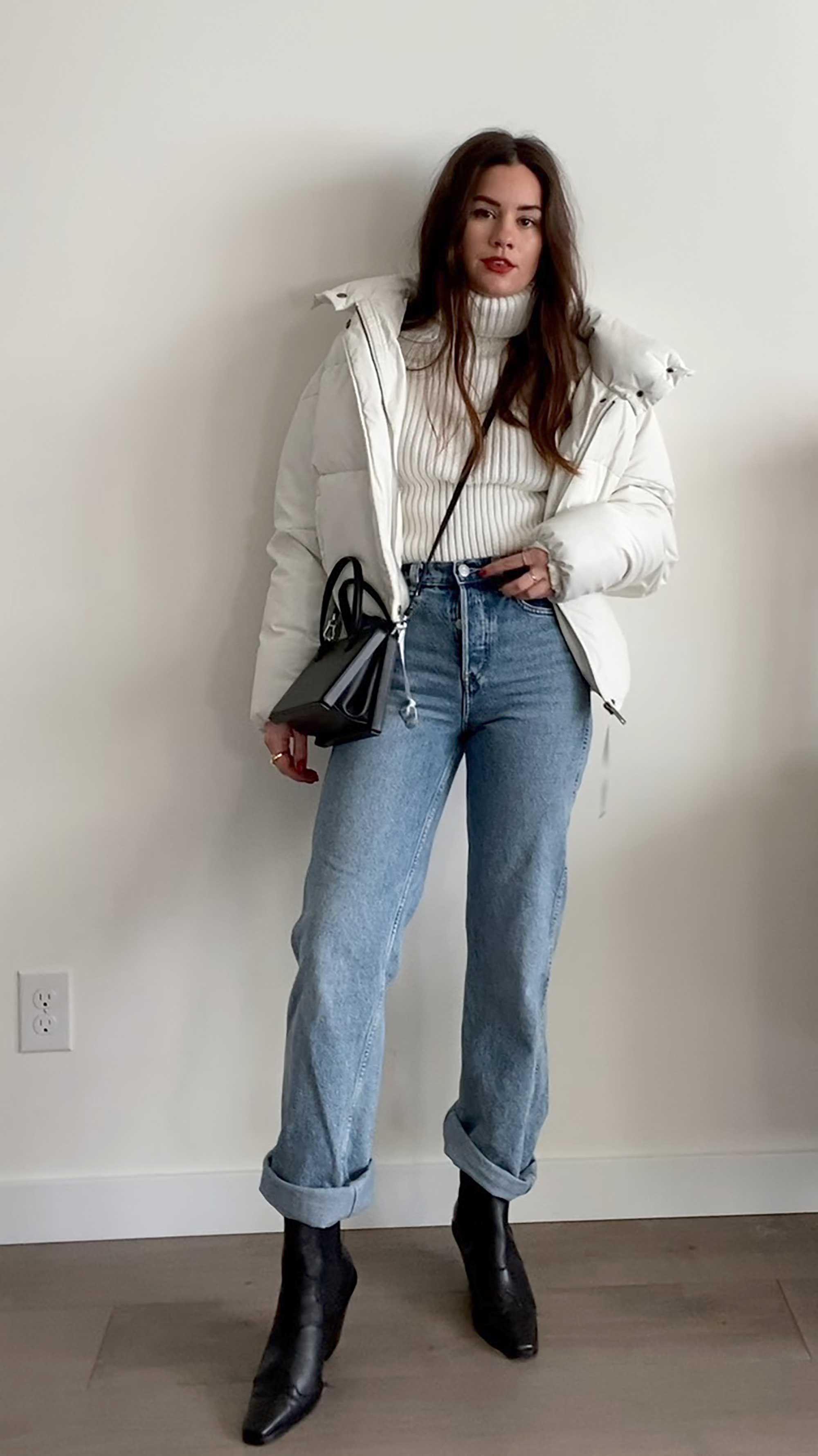 Click to shop outfit + more photos! Sarah Butler of Sarah Roberts wearing easy winter outfit featuring Apparis Camila Quilted Faux-Leather Puffer Jacket and & Other Stories Straight Mid Rise Organic Cotton Jeans