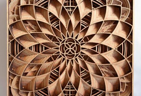 Oakland based artist Gabriel Schama loves to work with wood and precision cutting laser. He creates amazing densely layered wood relief sculptures that sometimes twist, sometimes intersect and overlap each other to create a mandala-like forms and pieces
