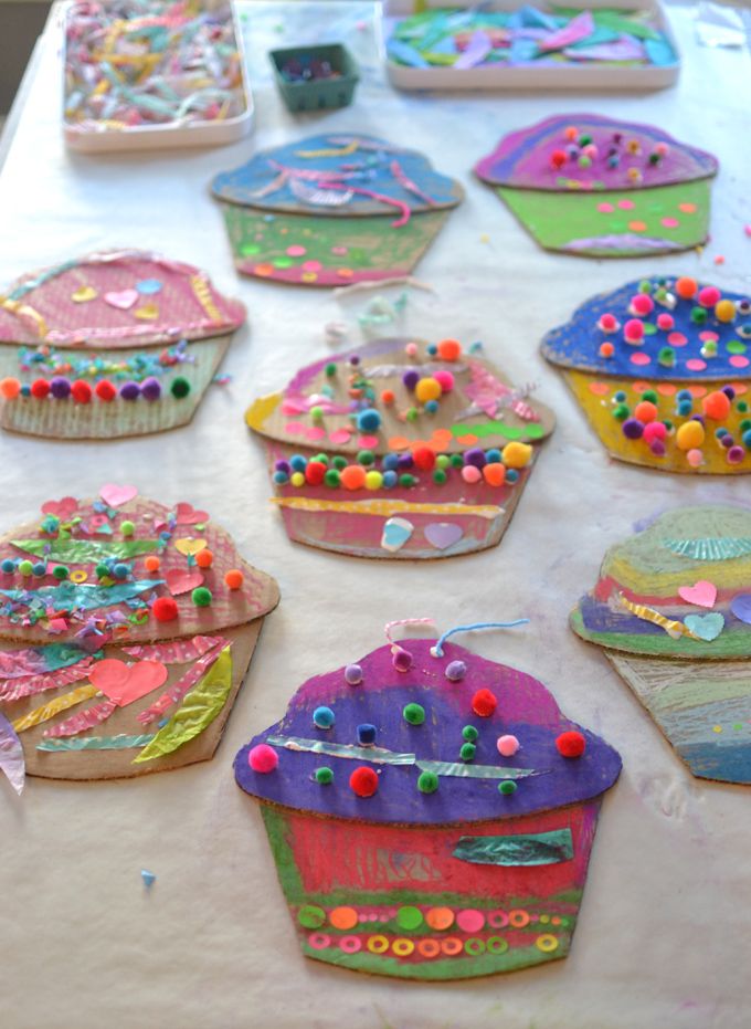 Children make giant cardboard cupcakes with oil pastels and collage, inspired by the artist Wayne Thiebauld.