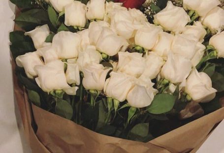 Meanwhile: Kourtney Kardashian showed off her beautiful bouquet of white roses
