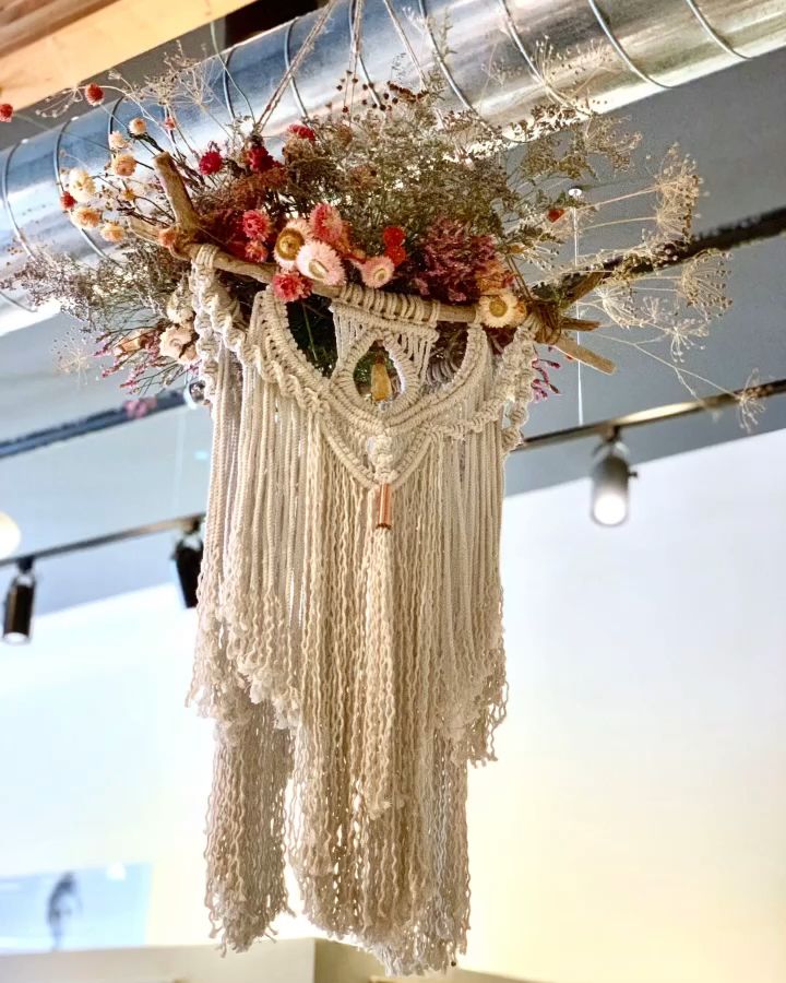 Fiber artist Lucy Lanuza teams up with Hana Floral Studio to create art for Boho Lifestyle shop in Napa. Come and see! #art #artinstallation #windowdisplay #visualmerchandising 