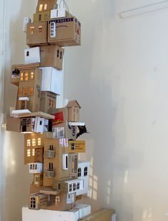 Australian artist, Annalise Rees, plays with space and drawing in her two and three dimensional ‘drawn’ house-scapes. Her work is sculptural and installation based, and she uses iconic everyday motifs such as the house and everyday materials such as street directories and dressmaking patterns as a way of connecting and investigating social and cultural attitudes towards the familiar.