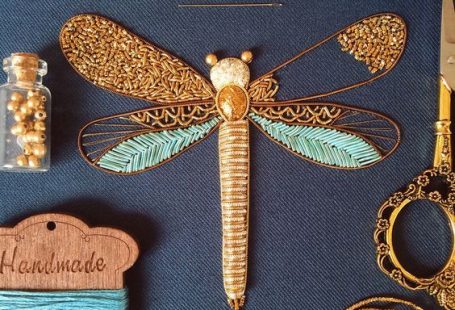 Bedford, England-based embroidery artist Humayrah Bint Altaf (previously) continues to construct ornate insects using shimmering threads and metallic beads. Her dragonflies, bees, beetles, and butterflies take shape using carefully paired patterns and colors that form wings, bodies, and even delicat