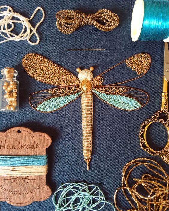Bedford, England-based embroidery artist Humayrah Bint Altaf (previously) continues to construct ornate insects using shimmering threads and metallic beads. Her dragonflies, bees, beetles, and butterflies take shape using carefully paired patterns and colors that form wings, bodies, and even delicat