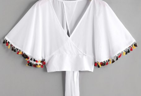 Shop Warp V Neckline Fringe Trim Tie Back Top online. SheIn offers Warp V Neckline Fringe Trim Tie Back Top & more to fit your fashionable needs.