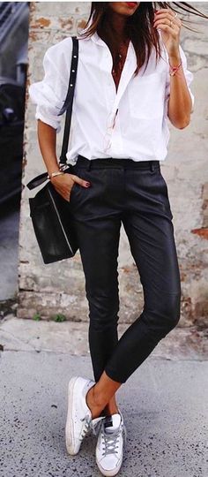 #Spring #Outfits White long-sleeved top and black pants.