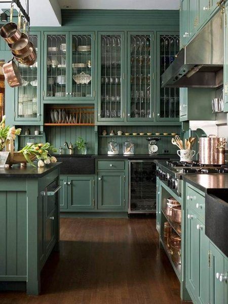 Love this green kitchen with black accents.