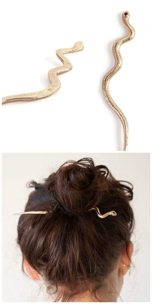 Mokao snake hairpin by Leo Black. In brass, with garnet eyes.