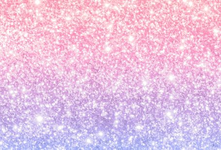 Pink and blue glittery pattern background vector