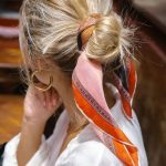 the trendiest way to wear your hair: tie it up in a printed scarf, hair bun tied with a scarf #haircare