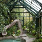 Backyard pool with water slide