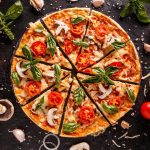 Flat lay with Italian pizza by Grafvision photography on Creative Market