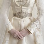 National costume of Caucasian bride. Close-up of a wedding dress. Wedding gown background. by Marmoset