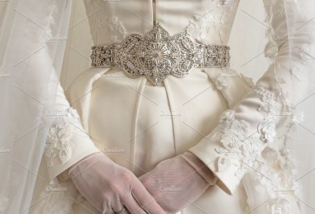 National costume of Caucasian bride. Close-up of a wedding dress. Wedding gown background. by Marmoset