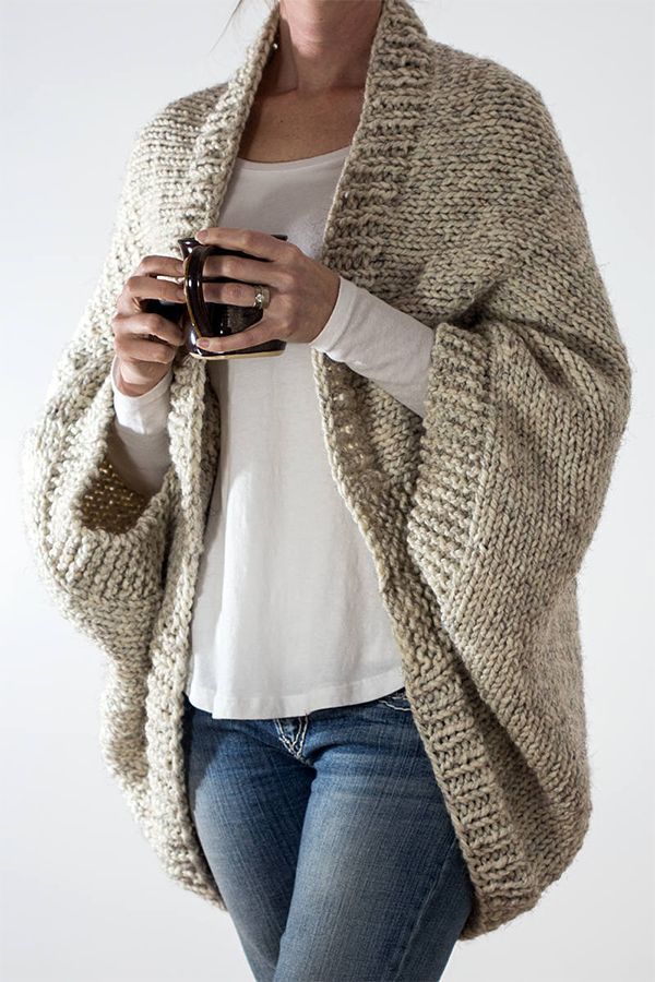 Knitting Pattern for Easy 18 Hour Cardigan - Cocoon cardigan knits up in about 14-18 hours according to the designer. Difficulty level: Super easy, beginner. 4 women's sizes: S, M, L & XL. Knit flat and seamed in super bulky yarn. Designed by Jennifer Thompson who allows you to sell finished sweaters from this pattern.