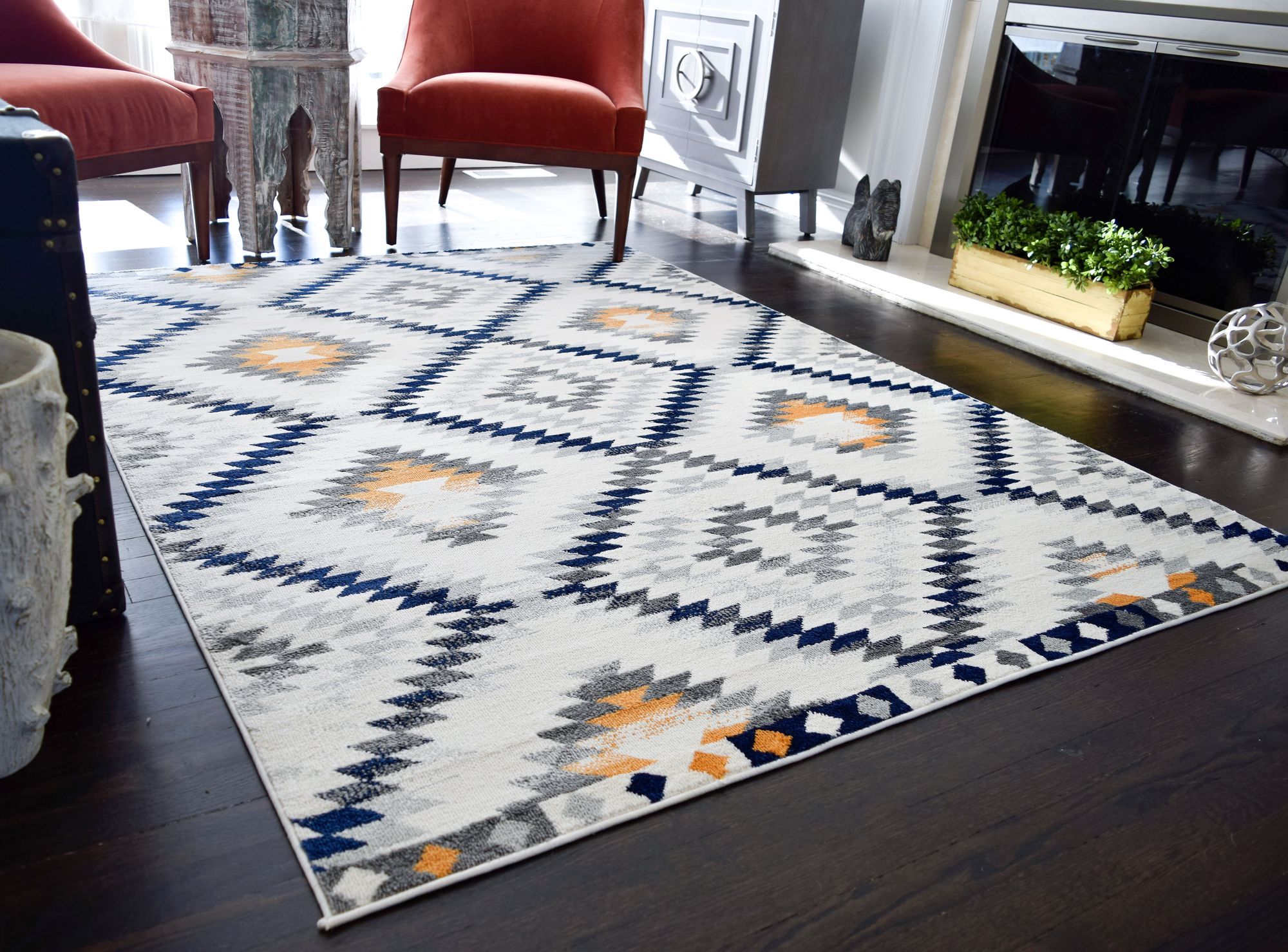 You’ll be patting yourself on the back for your great taste when you choose the Pembroke area rug. Designed with a cozy texture, this accessory is made from soft-touch polypropylene fibers and features an ultra soft, nearly half-inch thick pile. An appealing, Moroccan-style pattern designed with modern shades of graphite, dark blue, and honey are offset by a soft-white background.