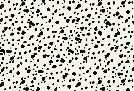 This wrapping paper sheet is patterned with a painterly black Dalmatian spot on a creamy soft white background. Effortlessly chic. Designed and manufactured by Paperboy.