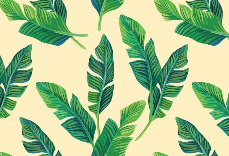 Get a tropical vibe with these highly stylized banana palm leaves in varying shades of green on a beige background. Available in both removable peel-and-stick and permanent wallpapers. Printed with child-safe inks.
