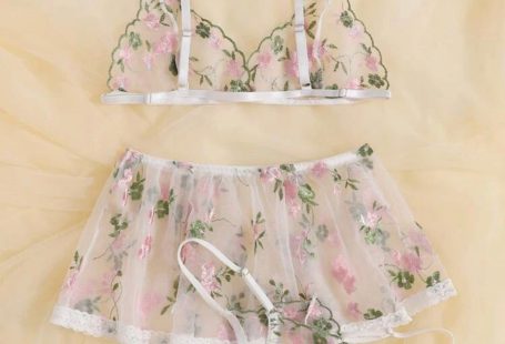 Description Style: Sexy Color: Gold Pattern Type: Floral Details: Embroidery, Ruffle Type: Sexy Sets Bra Type: Triangle Panty Type: Thongs & V-Strings Chest pad: No Padding Care Instructions: Hand wash, do not dry clean Material: Mesh Composition: 65% Cotton, 35% Polyester Fabric: Slight Stretch