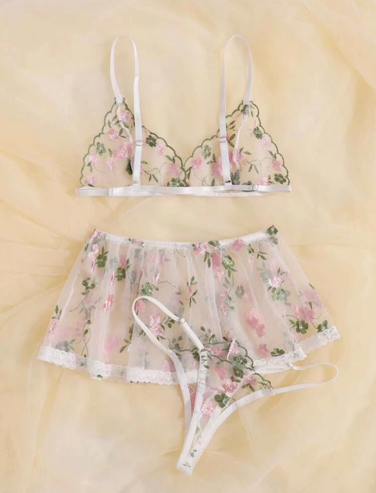 Description Style: Sexy Color: Gold Pattern Type: Floral Details: Embroidery, Ruffle Type: Sexy Sets Bra Type: Triangle Panty Type: Thongs & V-Strings Chest pad: No Padding Care Instructions: Hand wash, do not dry clean Material: Mesh Composition: 65% Cotton, 35% Polyester Fabric: Slight Stretch