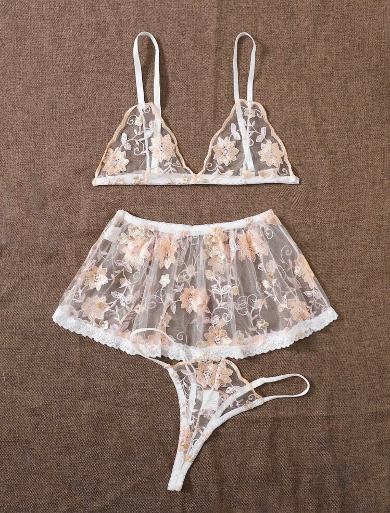 Description Style: Sexy Color: Gold Pattern Type: Floral Details: Embroidery, Ruffle Type: Sexy Sets Bra Type: Triangle Panty Type: Thongs & V-Strings Chest pad: No Padding Care Instructions: Hand wash, do not dry clean Material: Mesh Composition: 65% Cotton, 35% Polyester Fabric: Slight Stretch