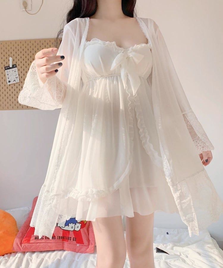 Pretty white babydoll features lace cups, cute bowtie, sheer material for a sexy look, and a matching robe. Sheer, unlined Pulls on; no closure One size fits most Pretty lace accent along sleeves and hems Full set includes 1 nightgown and 1 robe