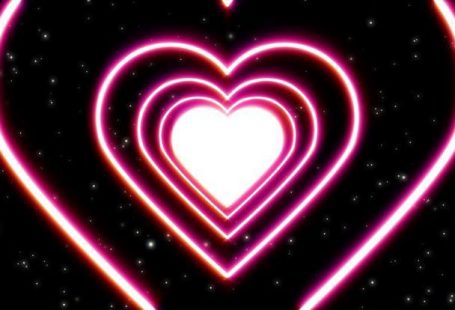 Love Heart Tunnel and Romantic Abstract Background --------------------------------------------------------------------------------------- heart, tunnel, romantic, love, abstract, particles, background, valentine, purple, pink, red, party, symbol, graphic, fantasy, wallpaper, vibrant, endless, illumination, stars, space