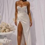 Sexy bridesmaids dress which is so low-cut your boobs hang out divides opinion