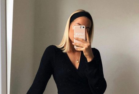 Crop Pullover mit Bindegurt in schwarz