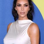 Kim Kardashian jokes she's 'always naked' while accepting award