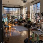 Beautiful sunny artist's daylight studio with industrial windows in Brooklyn