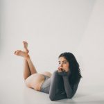 On my belly