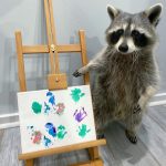 Proud Raccoon Artists Are Posing Next To Their Paintings And They Look So Happy