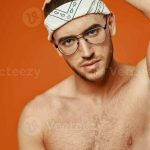 handsome man with glasses nude torso posing fashion sexy