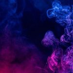Premium Photo | Colorful red and blue color smoke isolated on black background